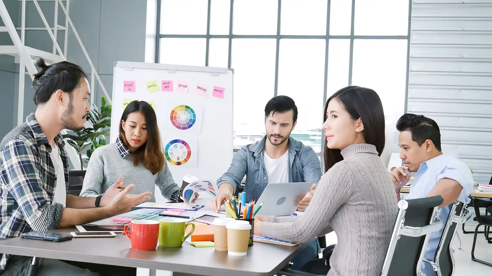 Diversity multiethnic team group of business people Present meeting conference room brainstorming business graph, chart. Multicultural Teamwork collaborate business team meeting together trust partner